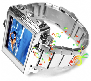 Illustration for article titled Multimedia Watch Makes Wrist Mounted Accessories Useful (Almost)